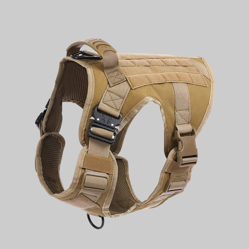 Tan tactical dog harness on a white background