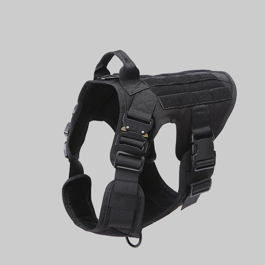 Black tactical dog harness on a white background